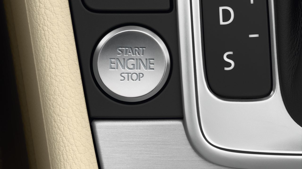 KESSY Locking and Starting System A close-up look of the Stop-Start button at the driver's central console area in a Volkswagen vehicle.