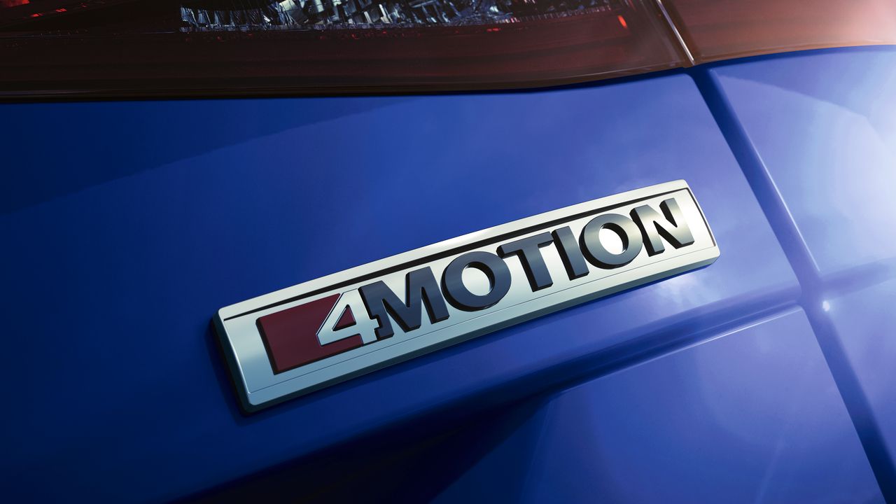 Volkswagen 4MOTION technology A close up look of the exterior of a Volkswagen vehicle's 4MOTION badge at its rear.